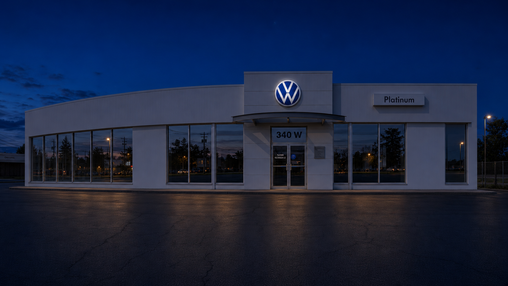 Platinum Volkswagen storefront in Hicksville at night